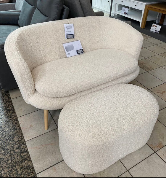 Fauteuil confortable en tissu beige