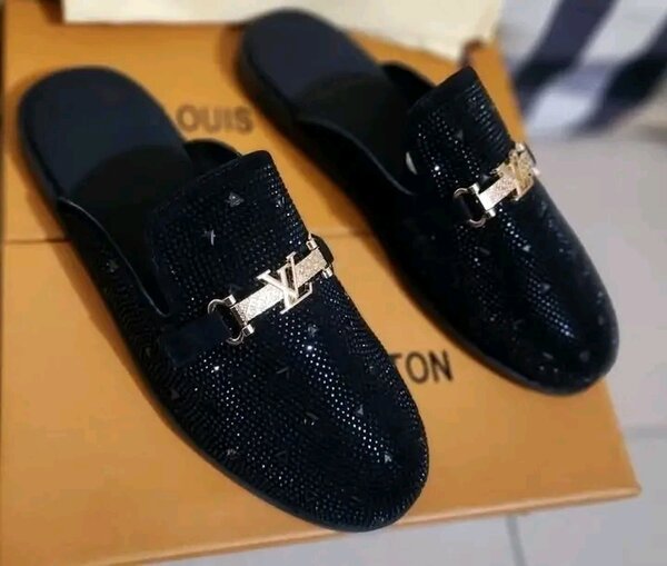 Mules en cuir noir pour homme