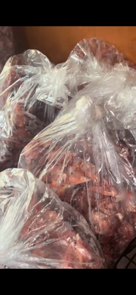 Tête de poulet frais emballé