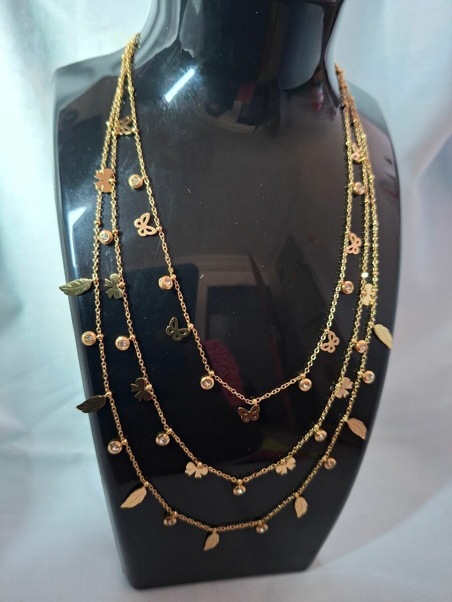 Collier doré pendentifs trèfle