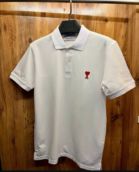 Polo blanc (AMI) élégant homme