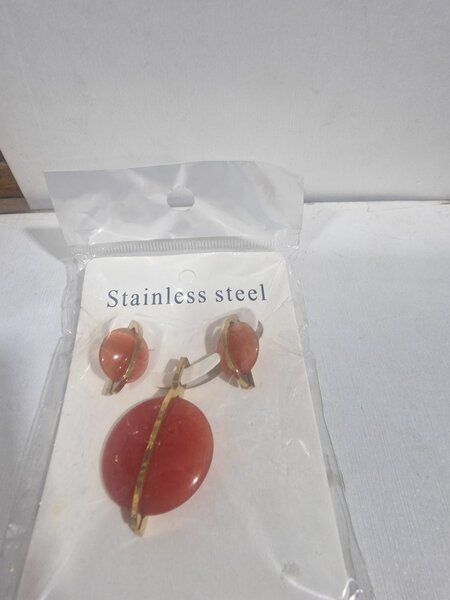 Médaille boucle oreilles