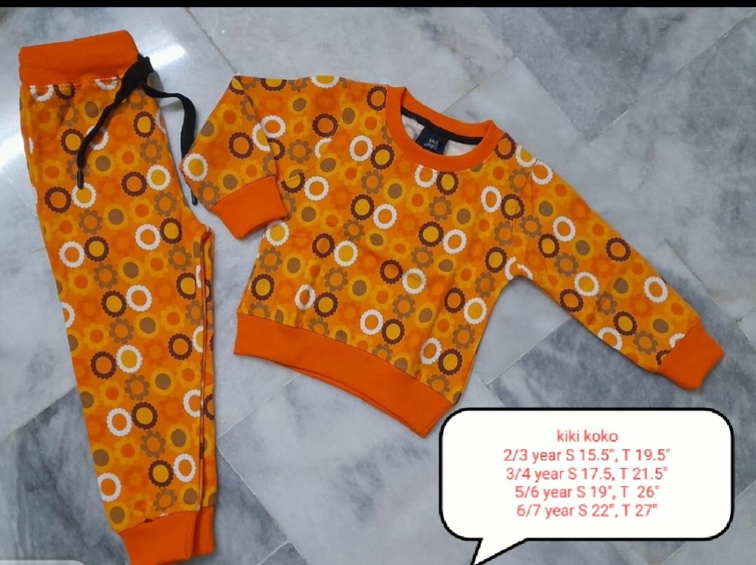 Taxtured floral track suit