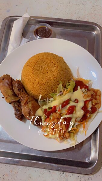 Jollof rice with chicken or chicken wings