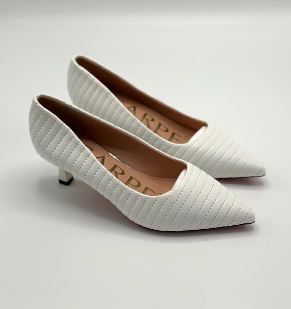 Ladies heels, bags and clothes