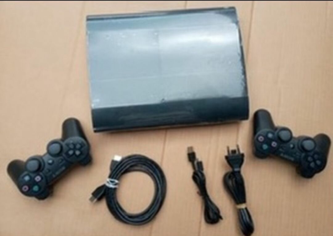 Console PS3 Sony avec manettes
