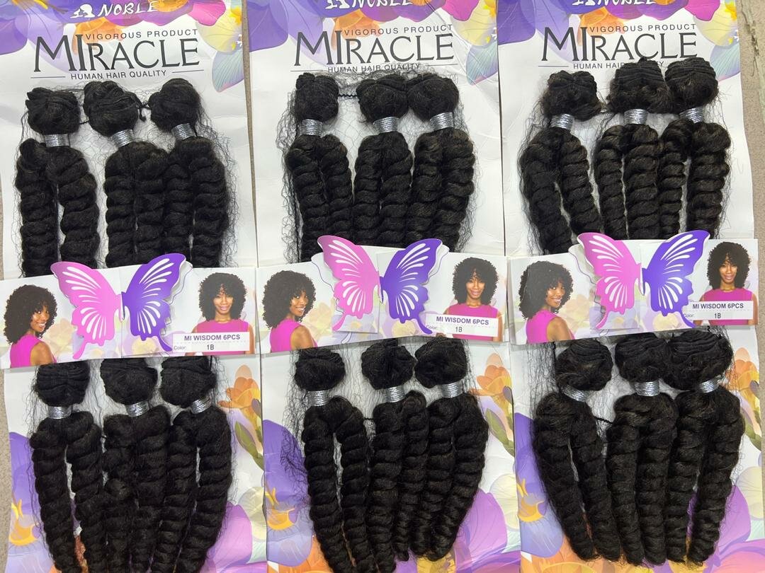 Extensions cheveux humains bouclés