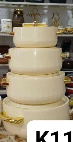 4 beige pots of different sizes