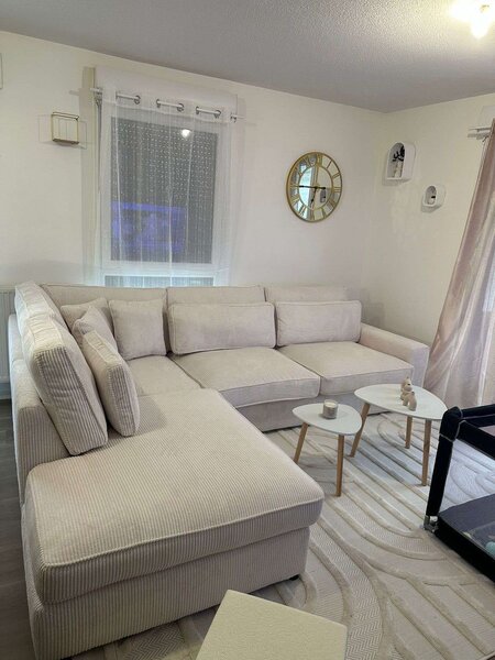 Canapé d'angle convertible en tissu beige