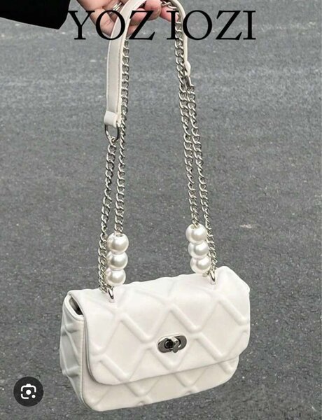 Sac à main élégant perlé