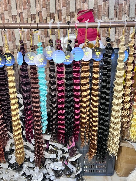 Extensions cheveux bouclés