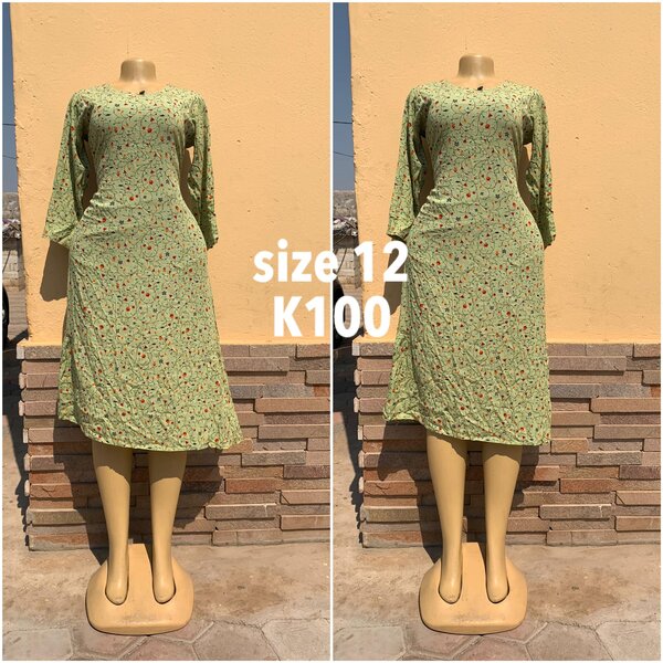 Green dress with floral print, size 12