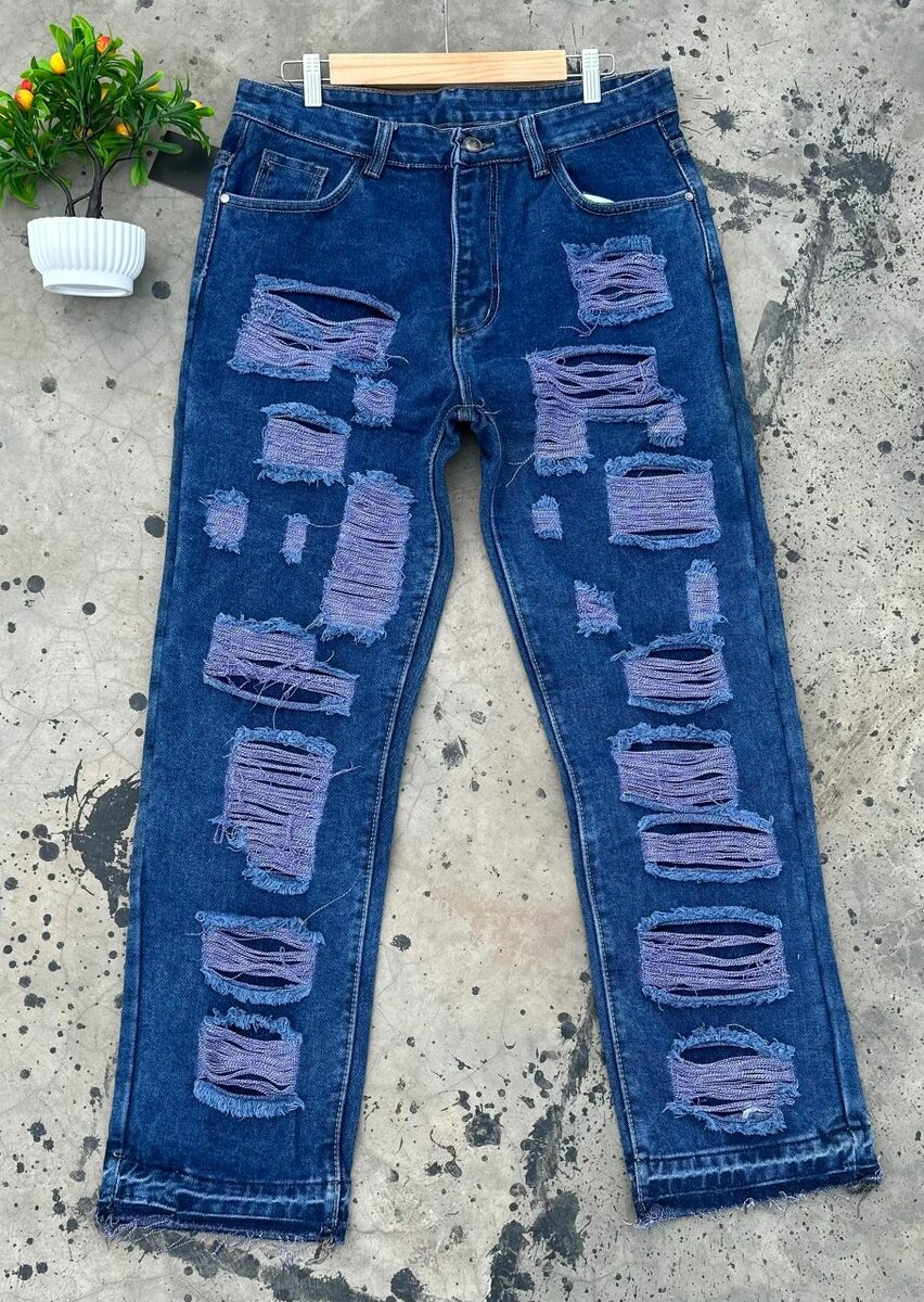 Jeans déchirés tendance unisexe