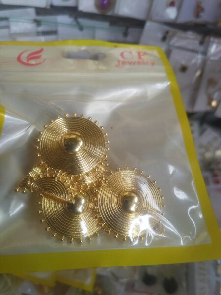Boucles d'oreilles en spirale dorée