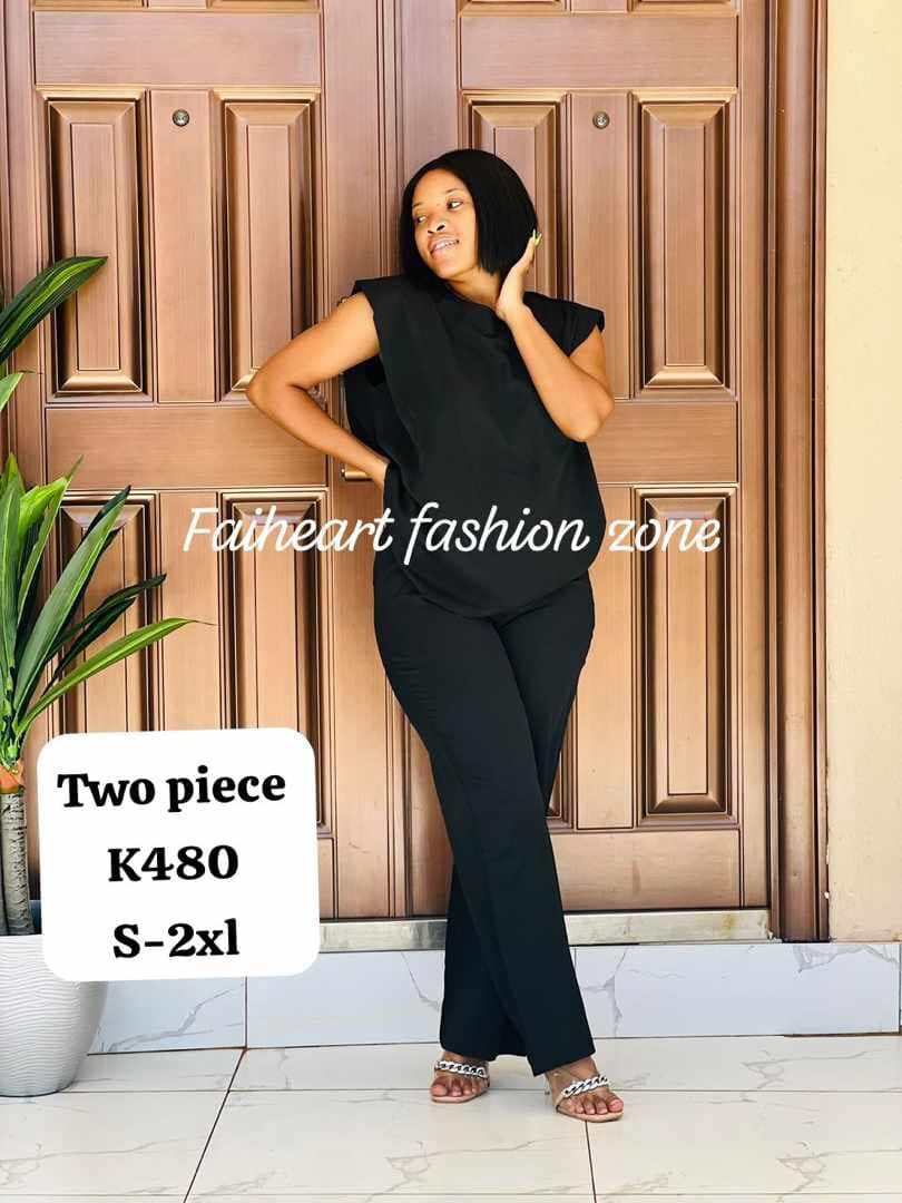 Women's suit is black, long-sleeved tunic and trousers    S-2xl