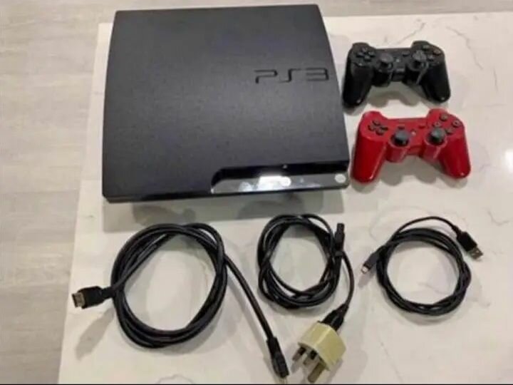 Console PS3 avec manettes
