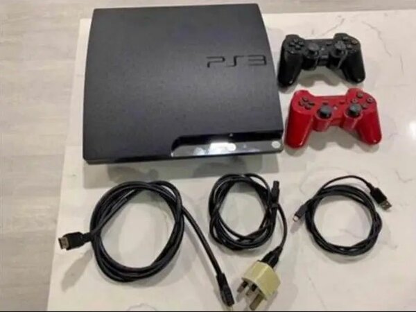 Console PS3 avec manettes