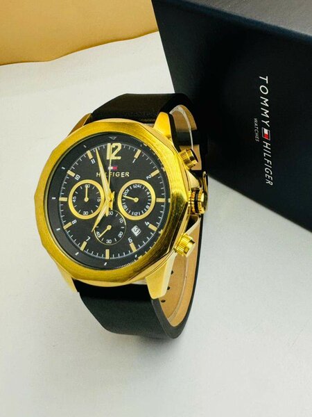 Montre homme élégante dorée