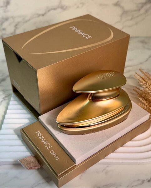 Appareil de massage doré