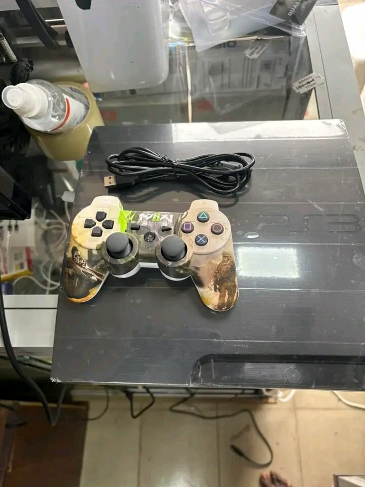 Console PS3 avec manette