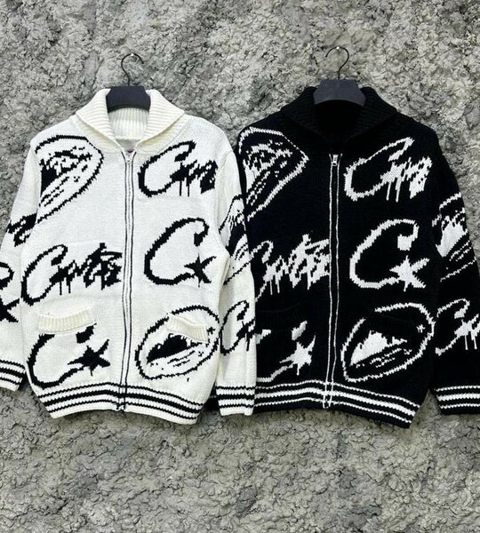 Veste en tricot à capuche et fermeture éclair