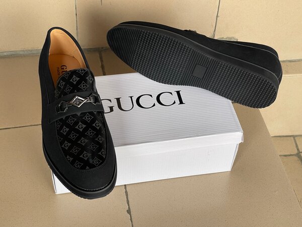 Chaussures Gucci en cuir noir pour homme