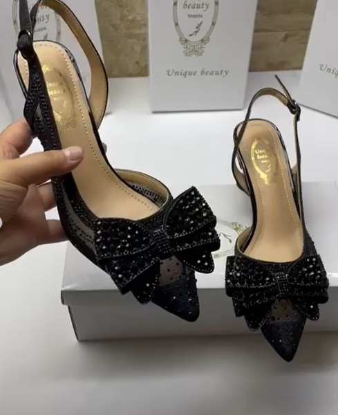 black shoes with a bow