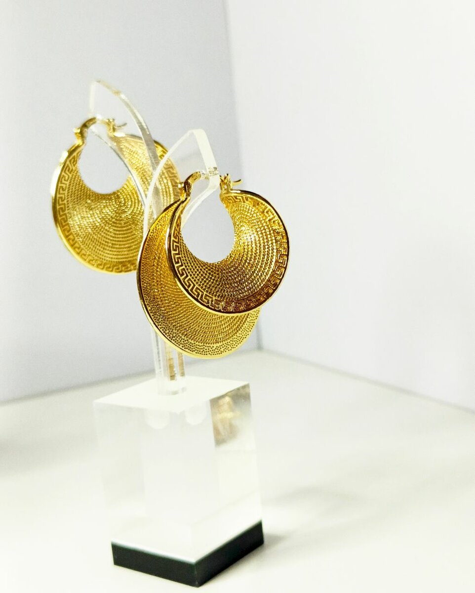 Boucles d'oreilles créoles dorées élégantes