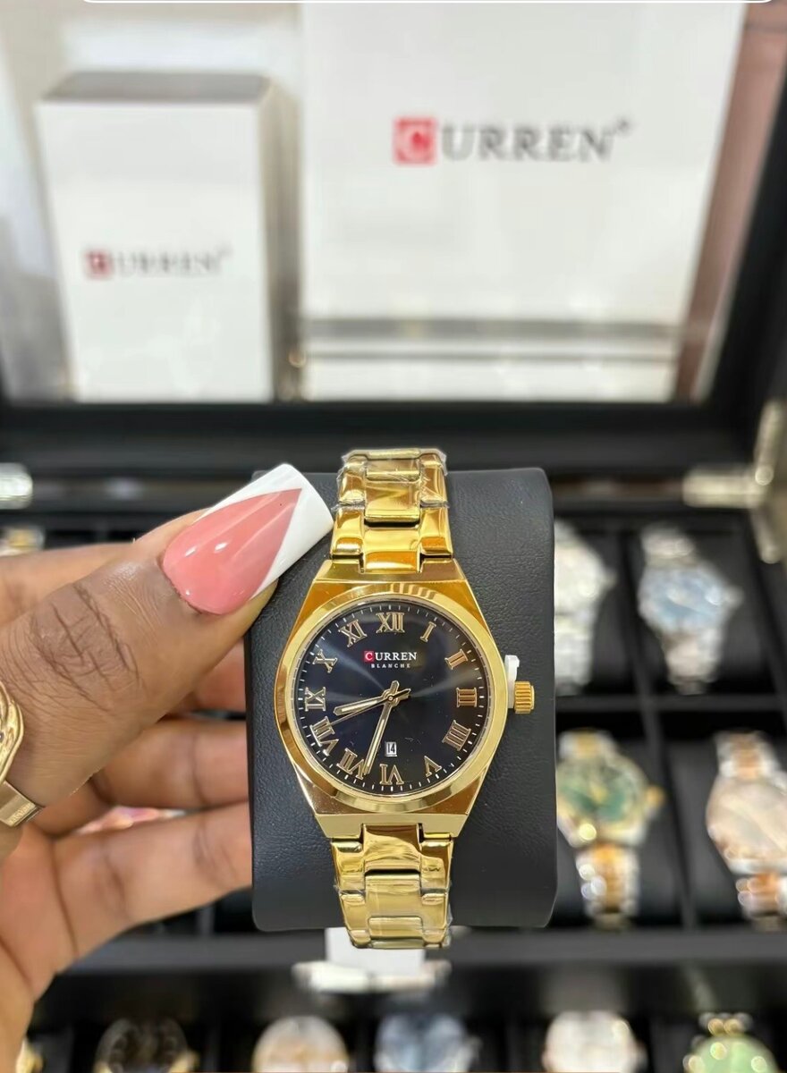 Montre dorée CURREN élégante