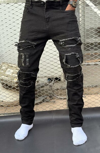 Jean slim noir déchiré