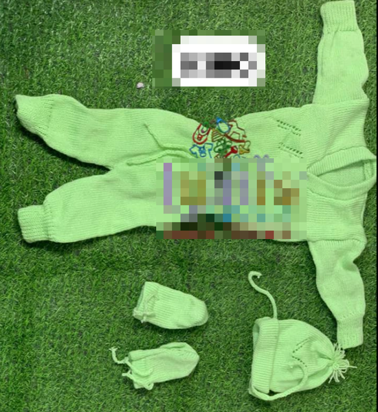 Knitted set for a newborn, light green color