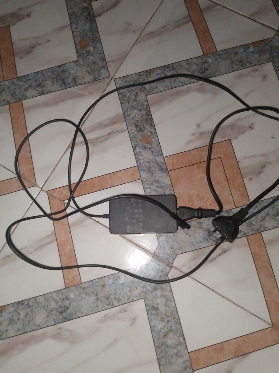 Power adapter for surface