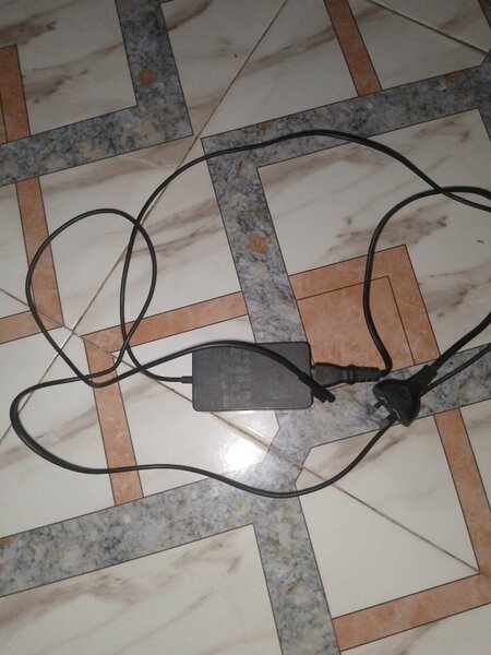 Power adapter for surface