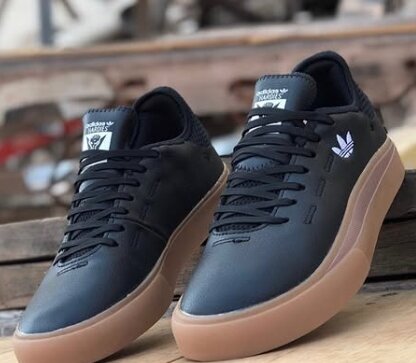 Boxed Adidas sneakers black