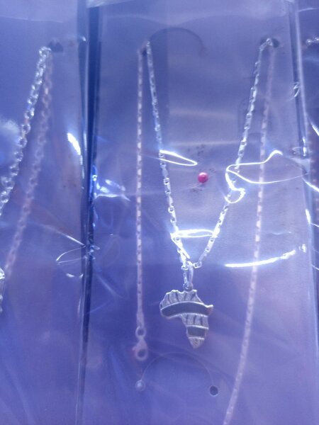 Silver necklace and locket