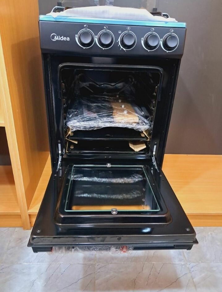 Midea 4 Burner gas stove with oven and Grill