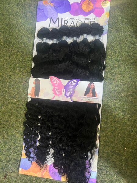 Extensions nattes bouclées naturelles