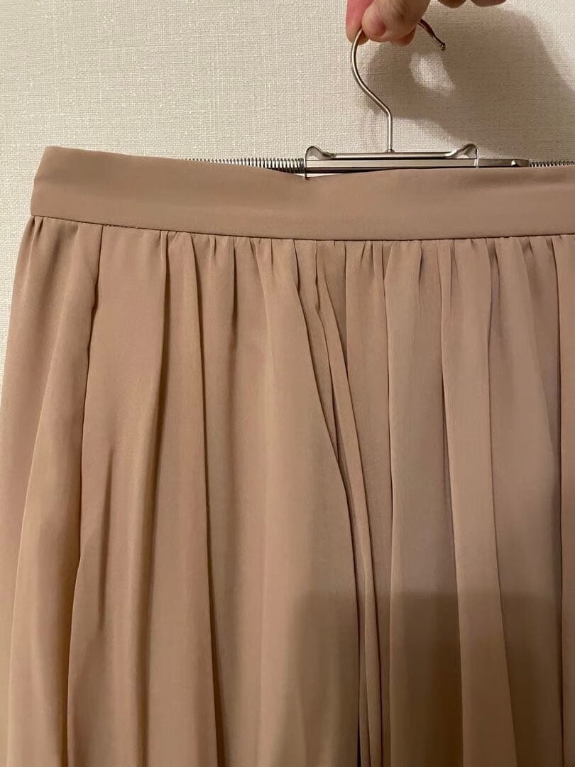 Jupe longue plissée beige