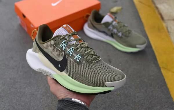 Nike men's running shoes, olive green with black logo, shock-absorbing sole