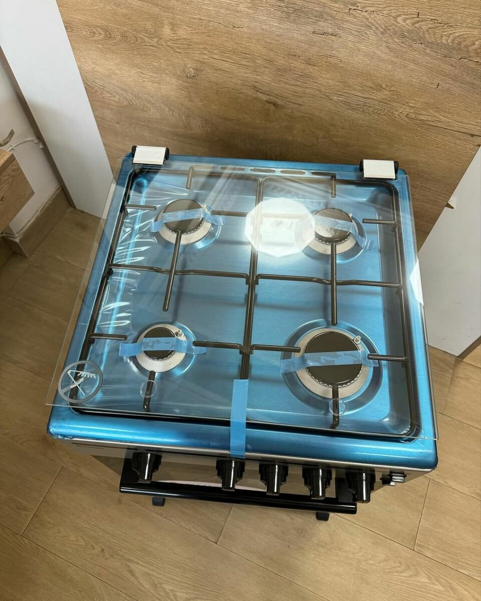 Chigo 4 burner gas stove/ Grill & Rotisserie Oven.