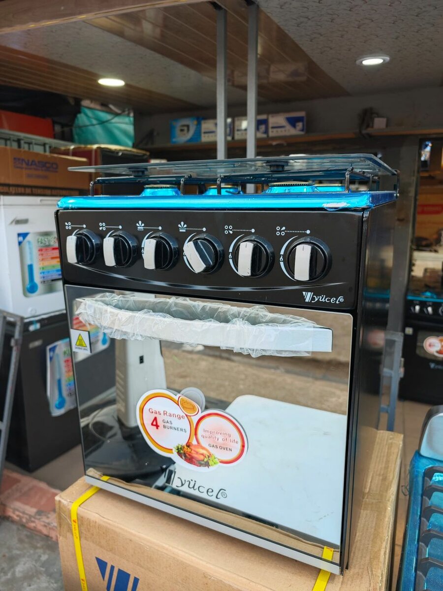 Mini cuisinière yucell 4 feux avec four neuf