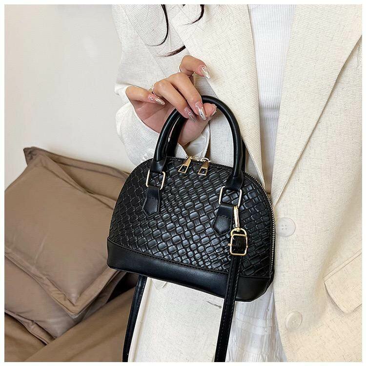 Petit sac en cuir tressé