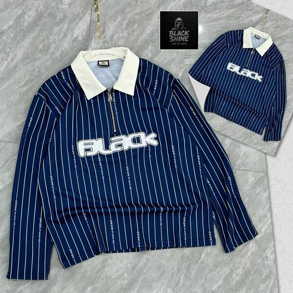 Polo zippé à rayures tendance