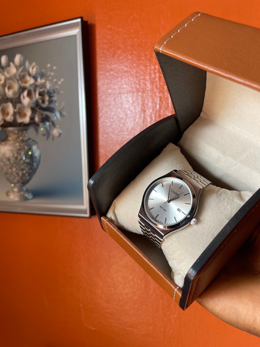 Casio argenté cadran blanc