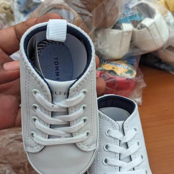 White lace-up sneakers for a girl