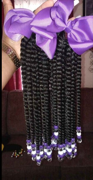 Extensions tressés avec perles