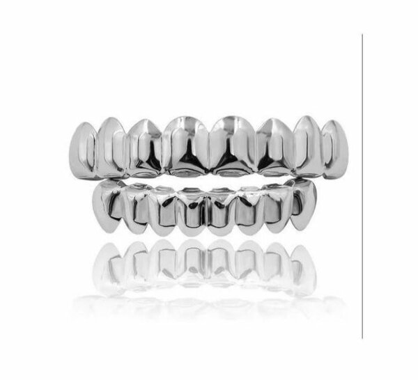 Grillz dentaires en acier inoxydable étincelant