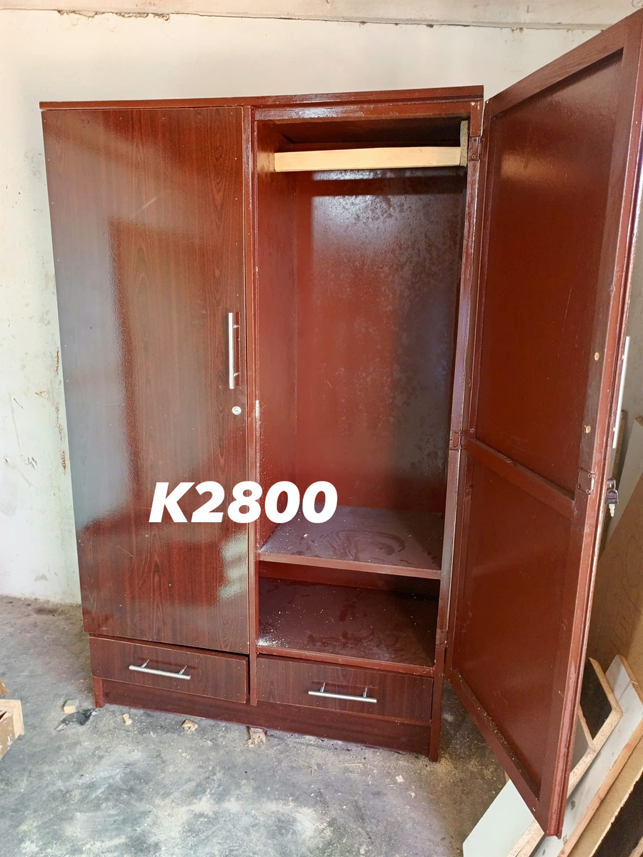 dark brown wardrobe with mirror