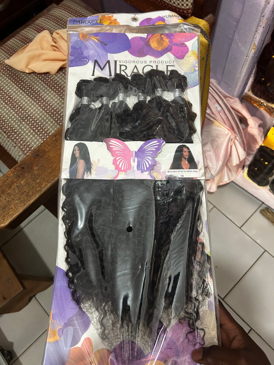 Extensions cheveux naturels bouclés