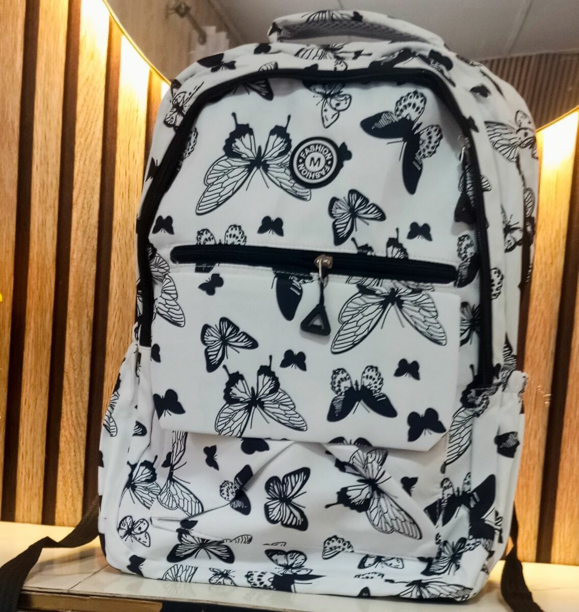 Sac à dos imprimé papillons